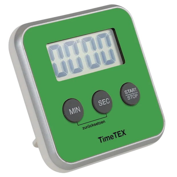 Anwendungsbild: TimeTEX Zeitdauer-Uhr "Digital" compact in vier Farben auf einem Schreibtisch neben Monitor
