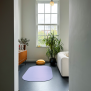 Abbildung 2: Stapelstein® Mat light violet liegt eingerollt in der Queransicht.
